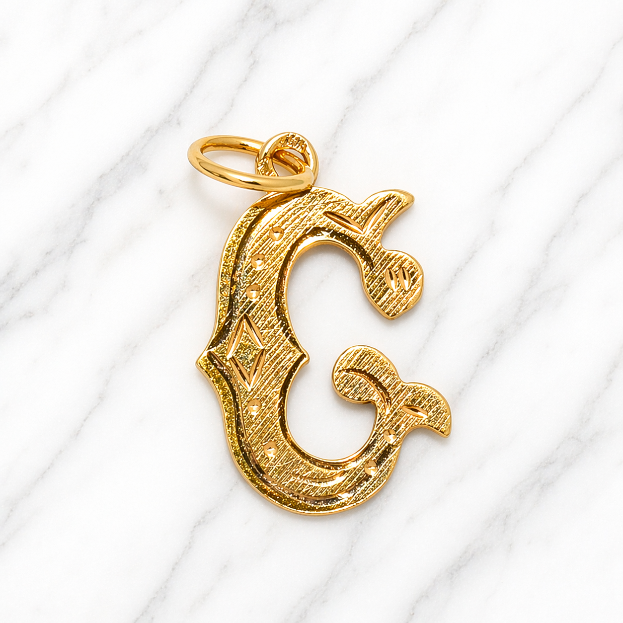 Gold letter 'C' pendant on a white background 19.2K Portuguese Gold | Large Initial Charm Letter Pendants Initial Letter C 