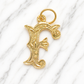 Gold letter 'F' pendant on a marble background 19.2K Portuguese Gold | Large Initial Charm Letter Pendants Letter F Initial Name Charm 