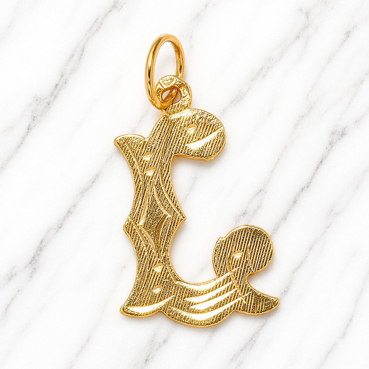 Gold pendant shaped like a stylized letter 'L' on a white background 19.2K Portuguese Gold | Large Initial Charm Letter Pendants 
