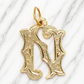 Gold pendant shaped like the letter 'N' on a marble background 19.2K Portuguese Gold | Large Initial Charm Letter Pendants