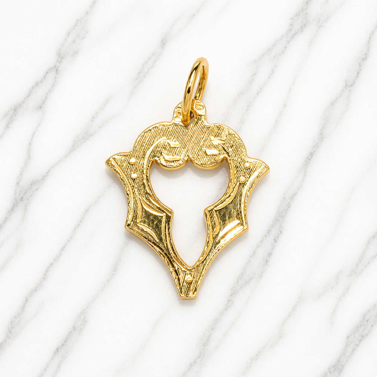 Gold pendant on a marble background 19.2K Portuguese Gold | Large Initial Charm Letter Pendants Letter V 