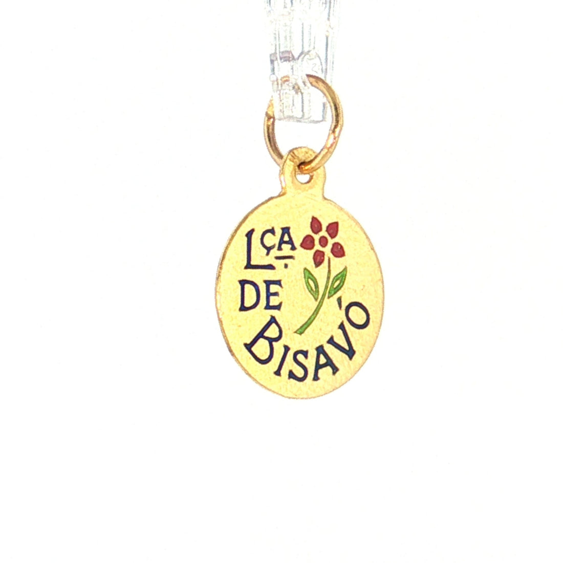 A round gold charm pendant with the text 'I'SA DE BISAVO' in black, a small red flower, and a green stem, hanging from a clear plastic loop on a white background. 19.2K Portuguese Gold | Lca de Bisavó (Great Grandmother) Charms