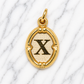 Gold pendant with letter 'X' on a marble background 19.2K Portuguese Gold | Oval Initial Charms