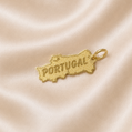Gold 'Portugal' map charm on a satin background 19.2K Portuguese Gold | Portugal Map Pendant