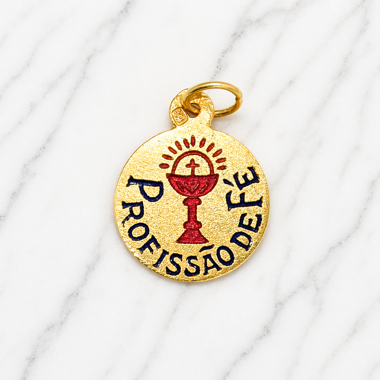 Gold pendant with red and black design on a white marble surface 19.2K Portuguese Gold | Profissao De Fe Charm