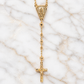 Gold rosary necklace on a marble surface 19.2K Portuguese Gold | Rosary Necklaces 18 inch