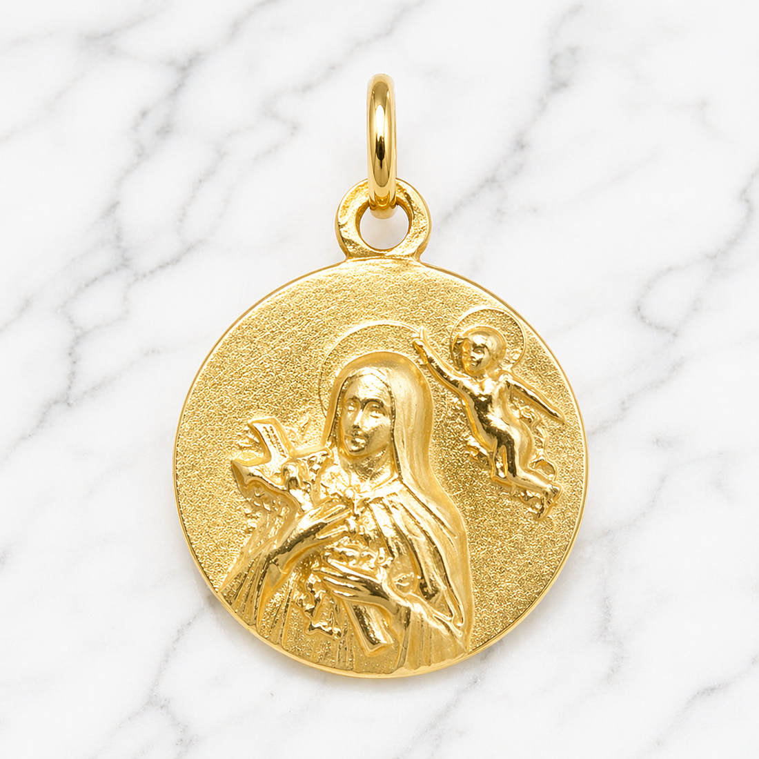 Gold pendant with religious design on a marble background 19.2K Portuguese Gold | Saint Teresa Pendant