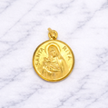 19.2K Portuguese Gold pendant with 'Santa Rita' on a marble background
