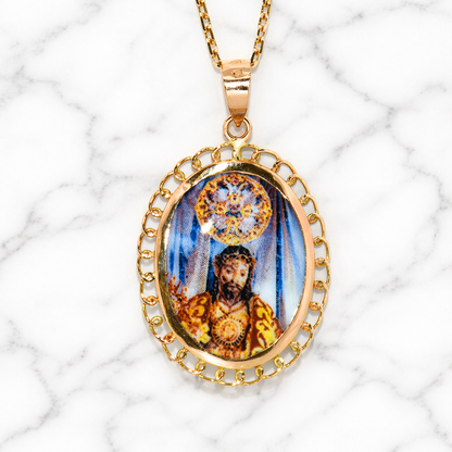 19.2K Portuguese Gold pendant with a religious God Santo Cristo Holy Christ scene on a marble background