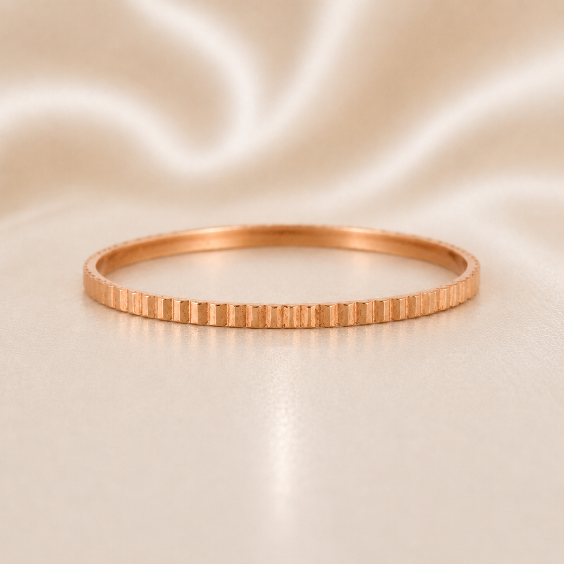 Rose gold bracelet 19.2K Portuguese Gold | Stackable/Promise Ring on a beige satin background