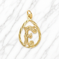 Gold pendant with intricate design on a marble surface 19.2K Portuguese Gold | Tear Drop Letters Letter F 