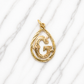 Gold pendant with a letter 'G' design on a marble surface 19.2K Portuguese Gold | Tear Drop Letters 