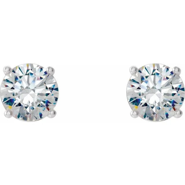 Pair of diamond stud earrings on a white background