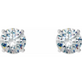 Pair of diamond stud earrings on a white background