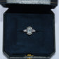 Diamond ring in a black jewelry box on a white background