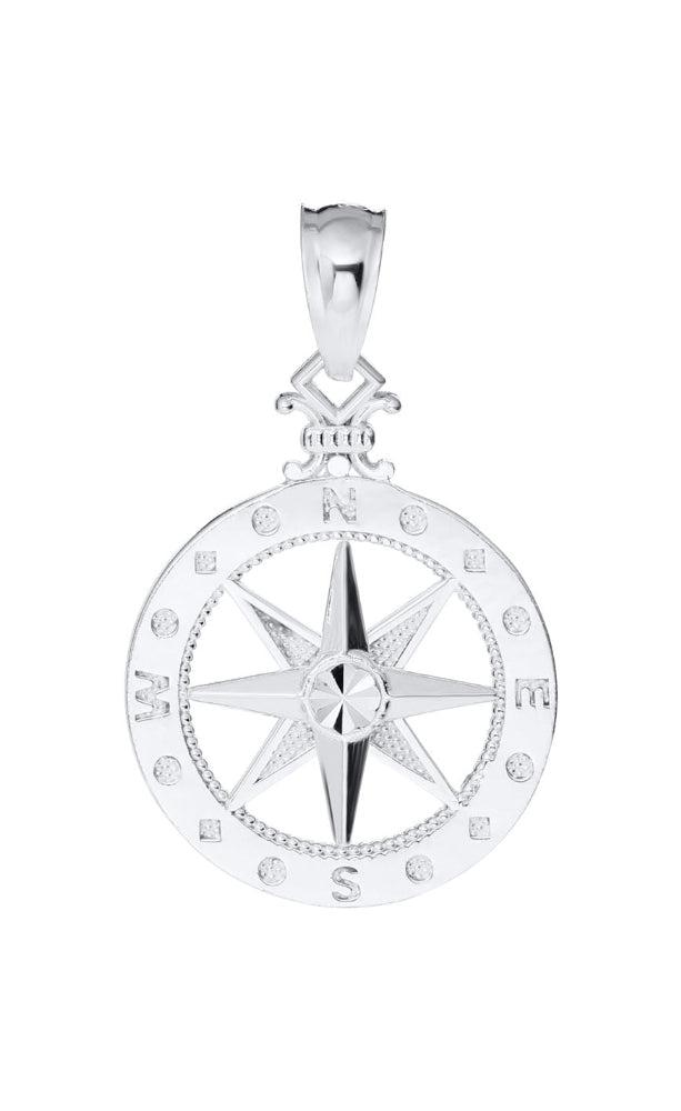 A silver compass pendant featuring a detailed eight-pointed star in the center, surrounded by engraved compass directions (N, S, E, W) and small clear stones, shown on a plain white background.