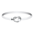 Black wok with a handle on a white background Cape Cod | Evening Tide 7" Sterling Silver Love Knot Cape Cod Bracelet