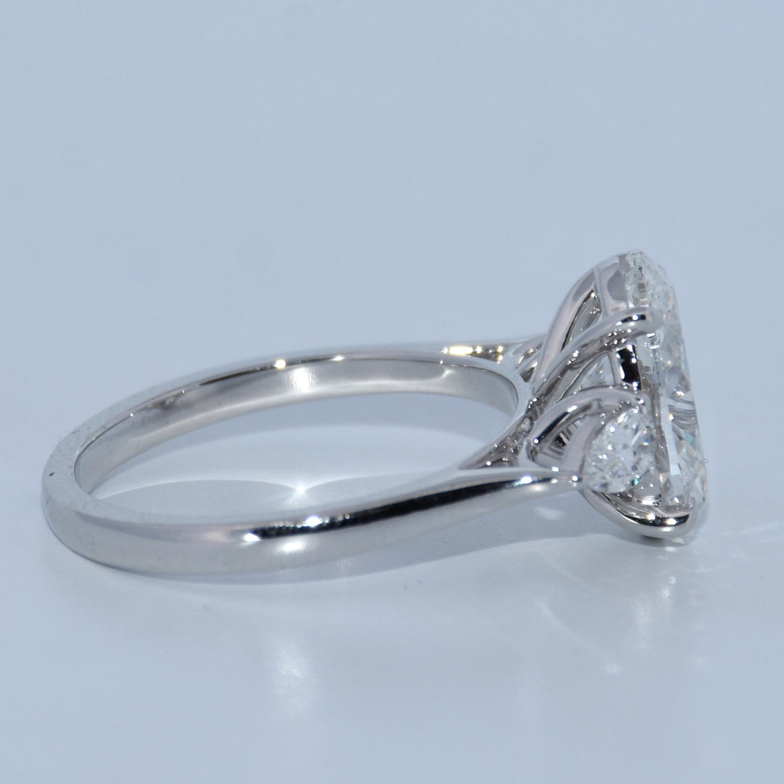 14K Gold | 3CT WG three-stone Oval Lab Diamond with Pear Side Stones Engagement Ring