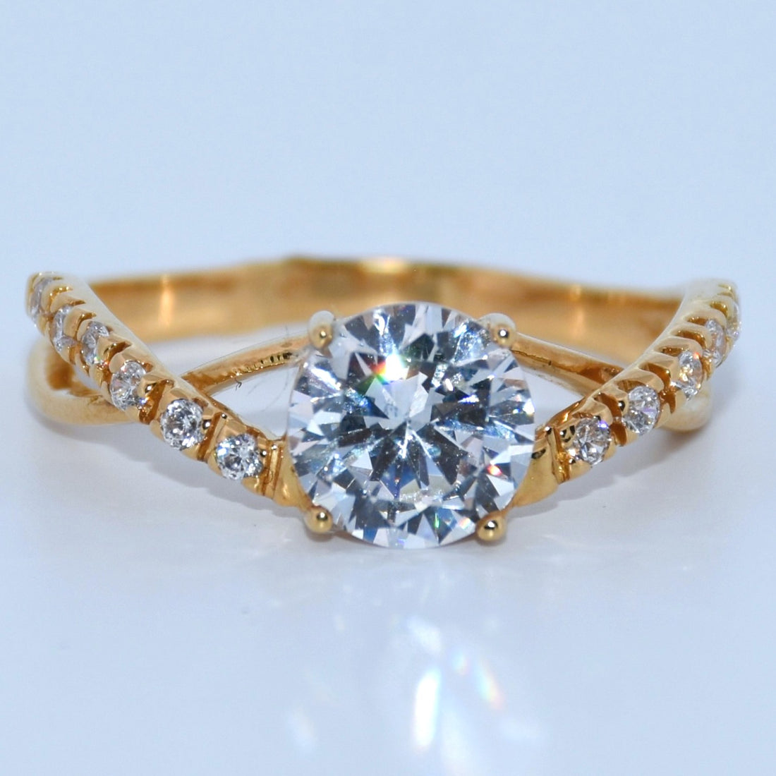 19.2K Portuguese Gold | Criss Cross CZ Ring