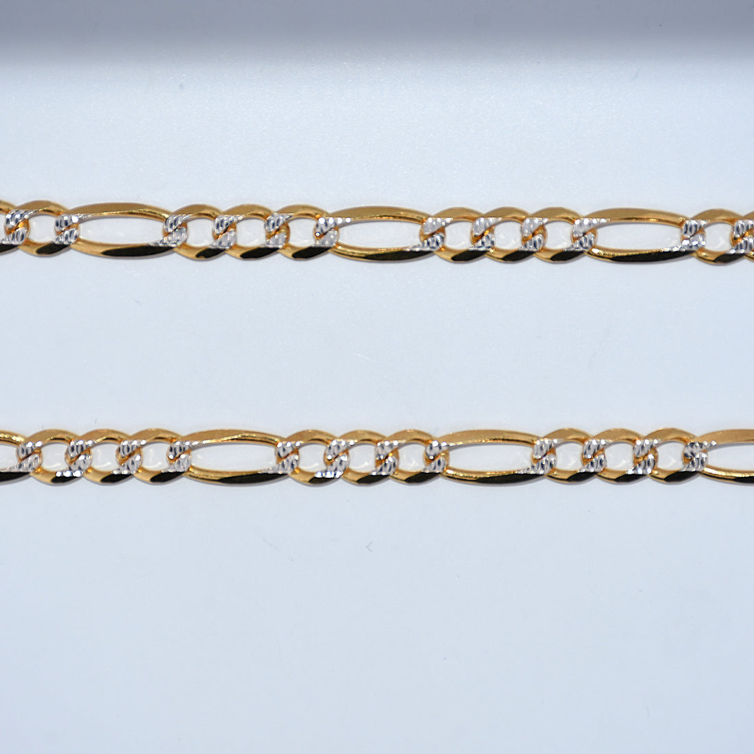 diamond cut figaro chain