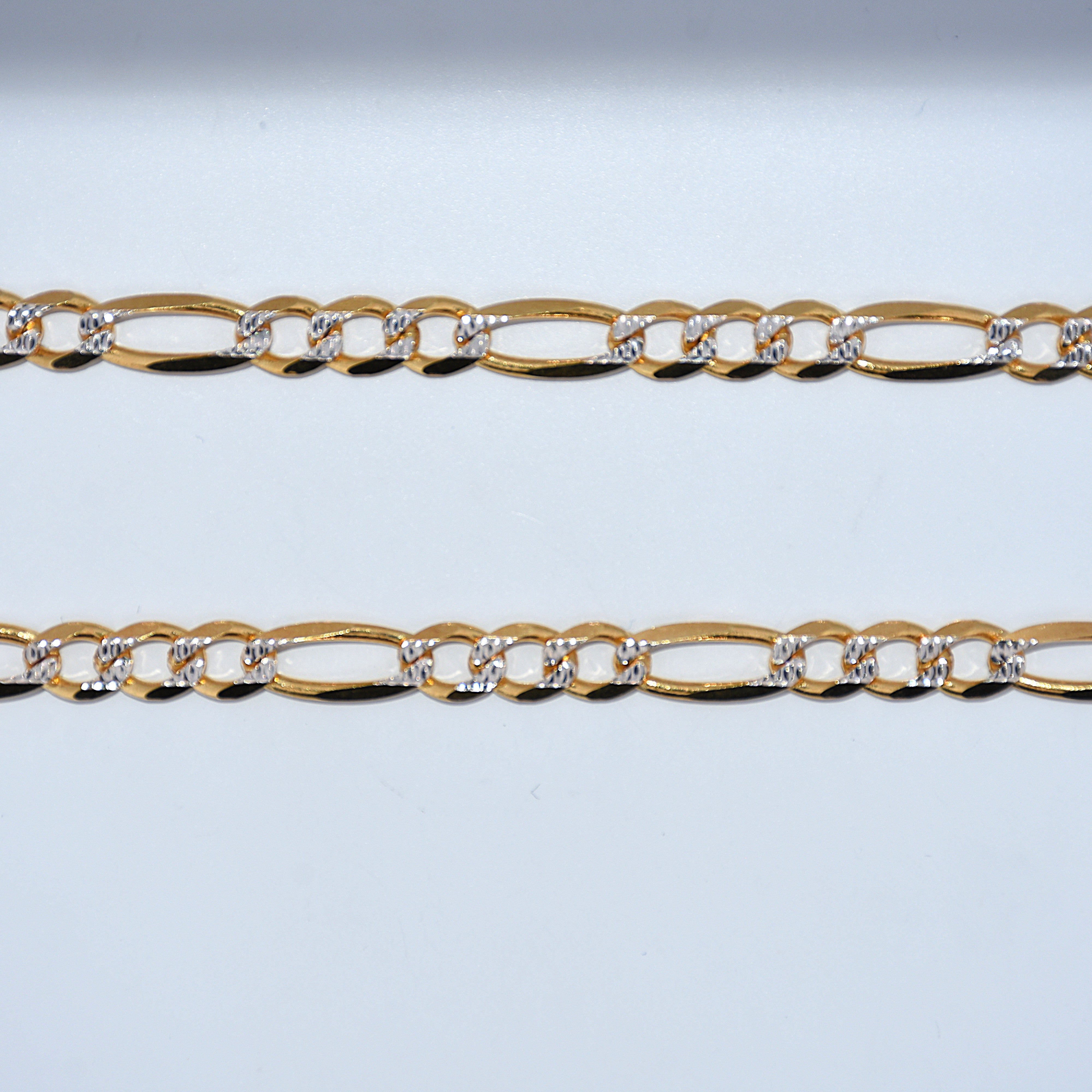 diamond cut figaro chain