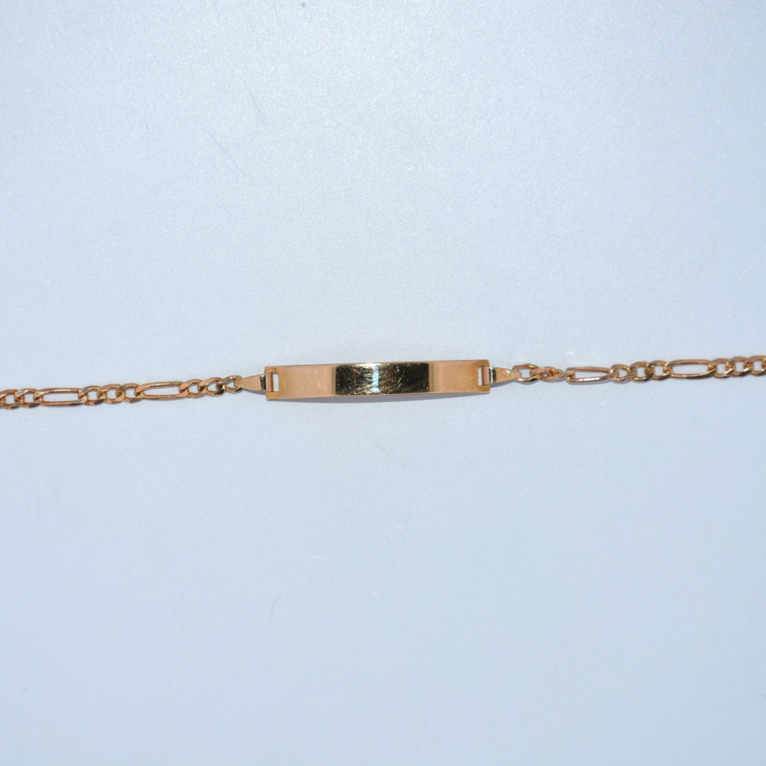 19.2K Portuguese Gold | Kids ID Figaro Bracelet 6" With Adjustable Links