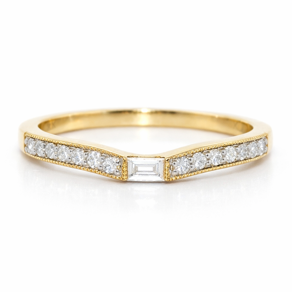 Gold ring with diamonds on a white background