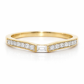 Gold ring with diamonds on a white background