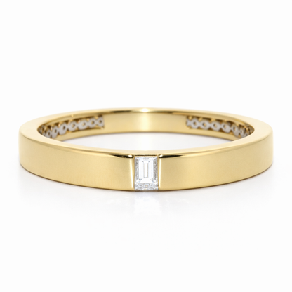 Gold ring with a central diamond and smaller diamonds on a white background