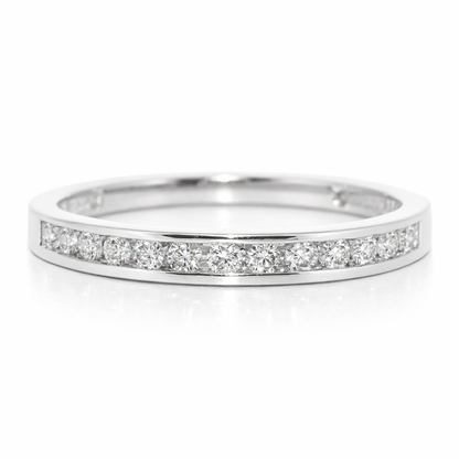 Silver ring with small diamonds on a white background