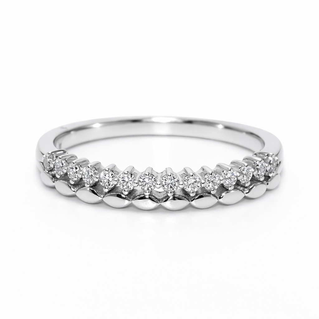 Silver ring with small diamonds on a white background