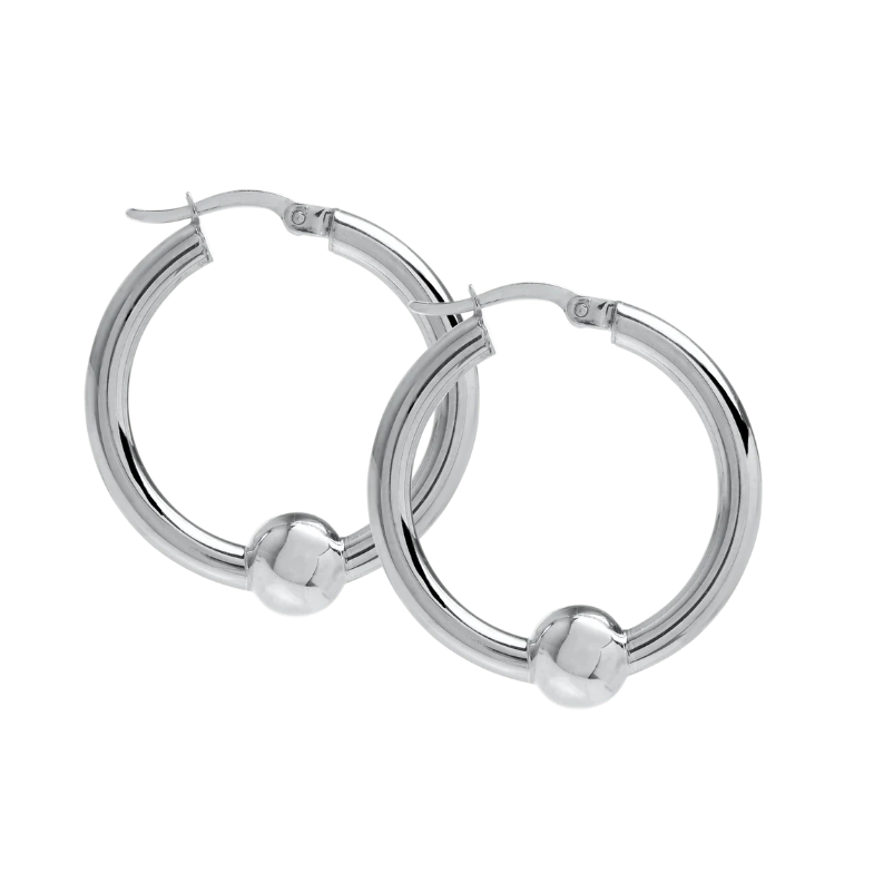 A pair of polished silver hoop earrings with a small spherical bead detail at the bottom of each hoop, shown on a plain white background.