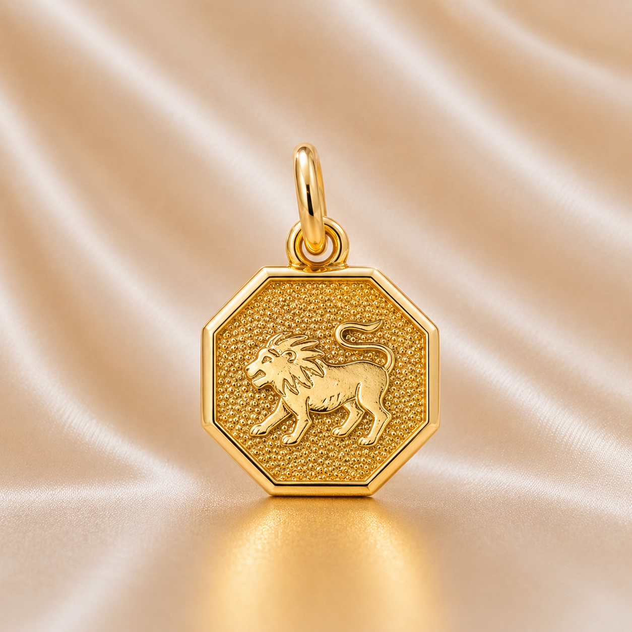 Gold lion pendant on a beige satin background 19.2K Portuguese Gold | Octagon Zodiac Charms Leo 