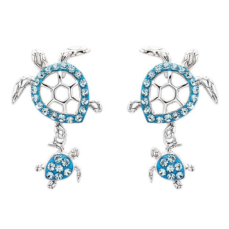 A pair of silver-toned turtle drop earrings embellished with bright blue rhinestones, shown on a plain white background.