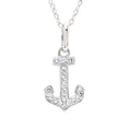 A silver anchor pendant necklace adorned with small clear crystals, suspended from a delicate silver chain against a plain white background.