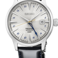 Seiko watch with a black leather strap on a white background