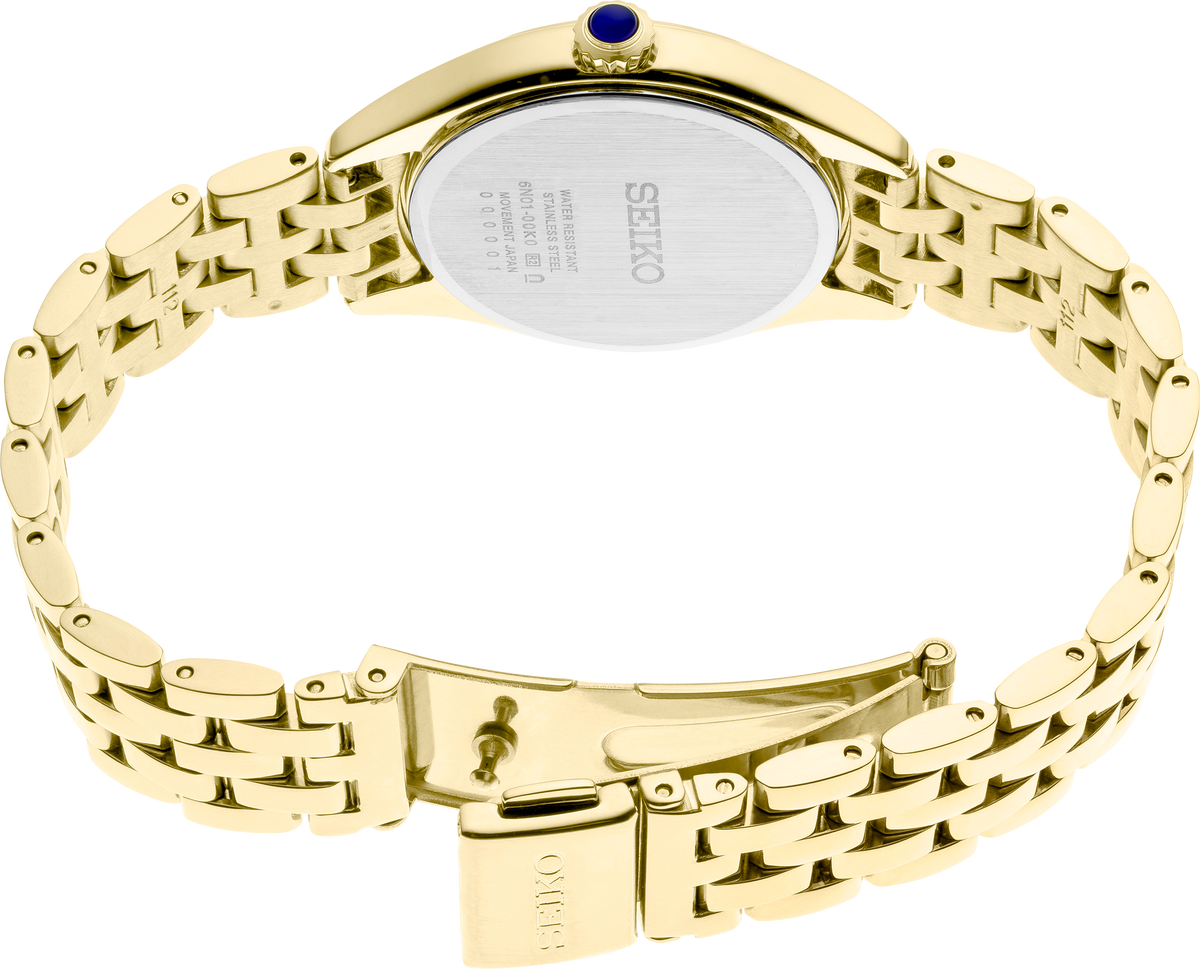 Gold watch with a white face on a white background