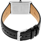 Seiko watch with black leather strap and silver case on a white background