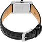 Close-up of a watch with black leather strap and silver case on a white background
