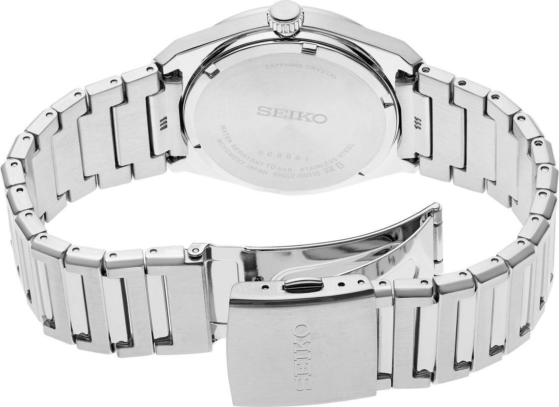 Silver Seiko watch with metal band on a white background