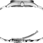 Close-up of a silver watch band on a white background