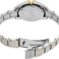 Close-up of a silver and gold Seiko watch with a white background