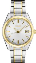 Seiko watch with two-tone metal strap on a white background