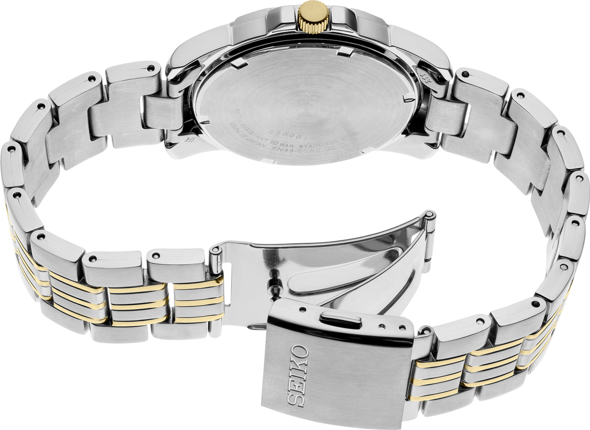 Silver and gold watch with Seiko branding on a white background