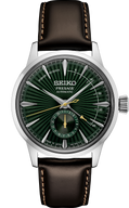 Seiko Presage watch with green face and brown leather strap on white background