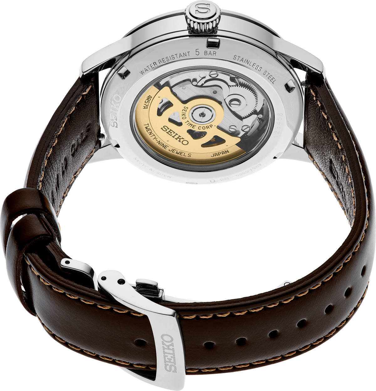 Seiko watch with brown leather strap and visible mechanical components on a white background