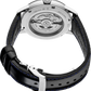 Close-up of a Seiko watch with black leather strap and visible mechanical components.