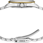 Close-up of a silver watch with a gold face on a white background