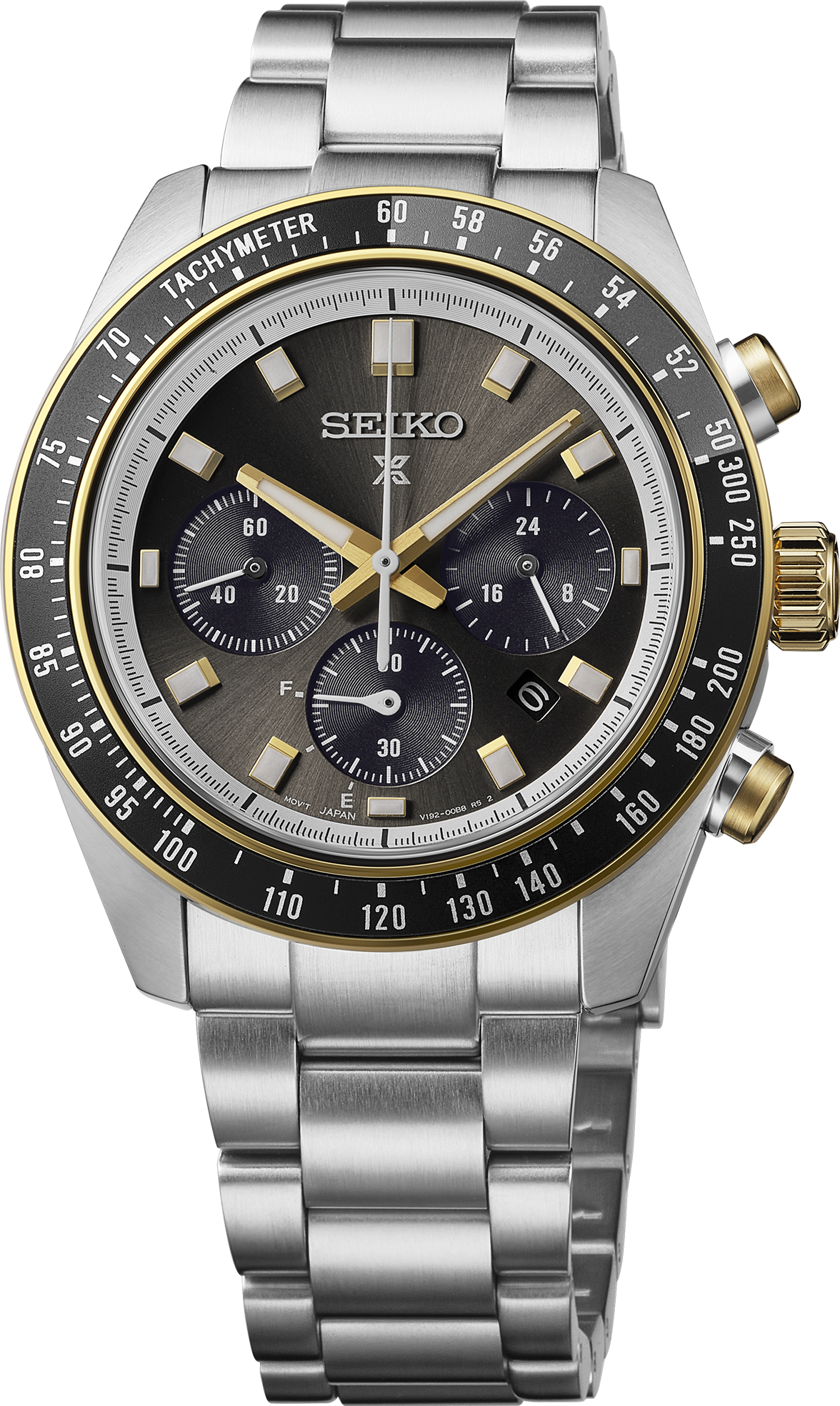 A Seiko wristwatch with a stainless steel link bracelet, featuring a dark gray dial, gold-tone accents on the bezel and crown, and a black tachymeter bezel.