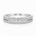 Two diamond rings stacked on a white background